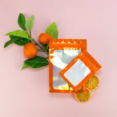 Flat Zipper Seal Bags – Orion Orange QuickQlick® with Clear Window and Holographic Inside