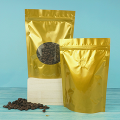 Glossy Sweet Cream Gold Round Window Plastic and Mylar Stand Strong® Coffee Valve Bags
