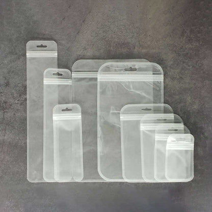 QQ Studio® Single-Sided Transparent and Translucent Back Plastic Flat QuickQlick™ Bags with Rounded Corners and Butterfly Hang Hole