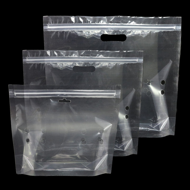 QQ Studio® Holy Clear Polyethylene Stand QuickQlick™ Bags with Die Cut Handles and Vent Holes