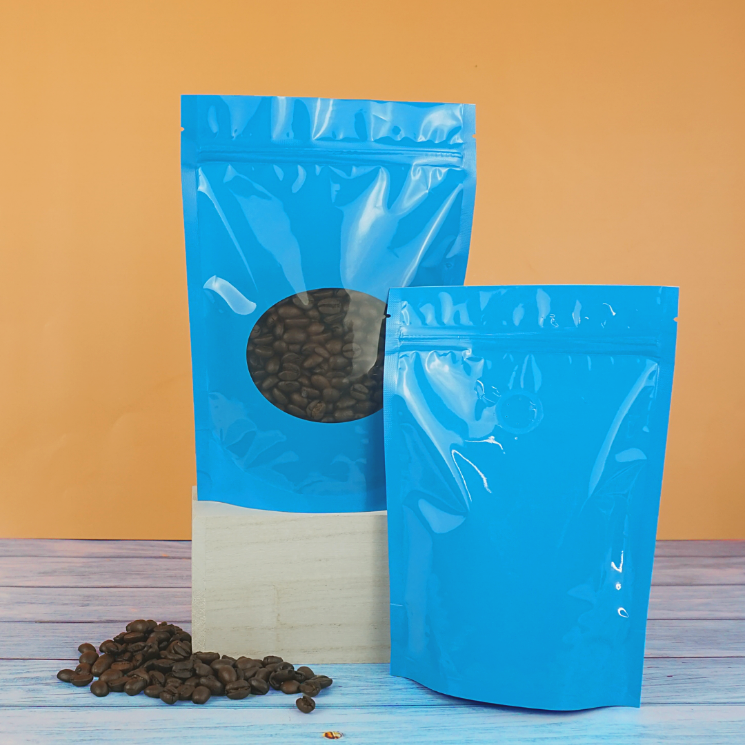 Glossy Full Bodied Wavy Blue Round Window Plastic and Mylar Stand Strong® Coffee Valve Bags