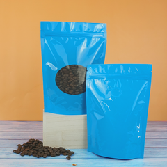 Glossy Full Bodied Wavy Blue Round Window Plastic and Mylar Stand Strong® Coffee Valve Bags