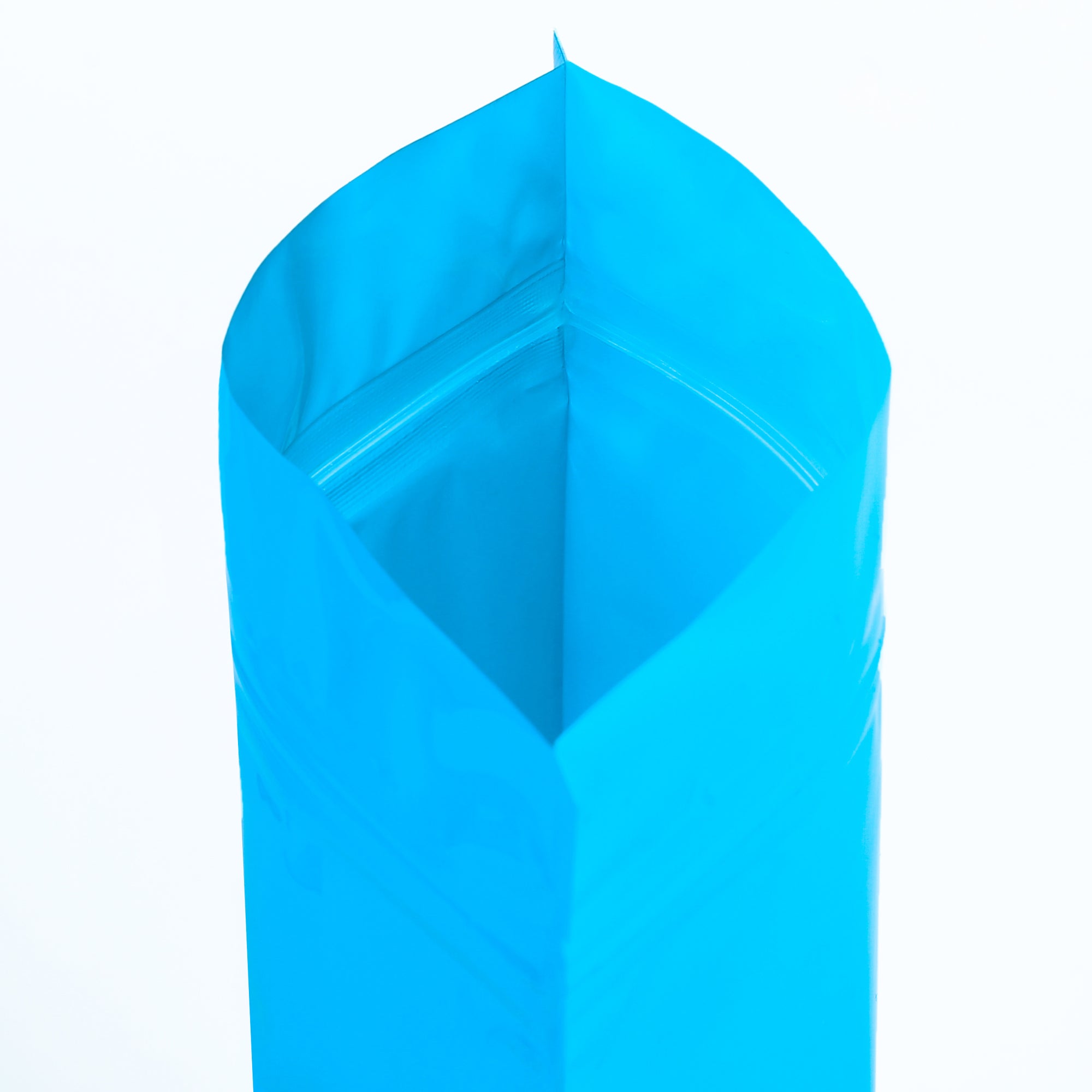 Glossy Full Bodied Wavy Blue Round Window Plastic and Mylar Stand Strong® Coffee Valve Bags