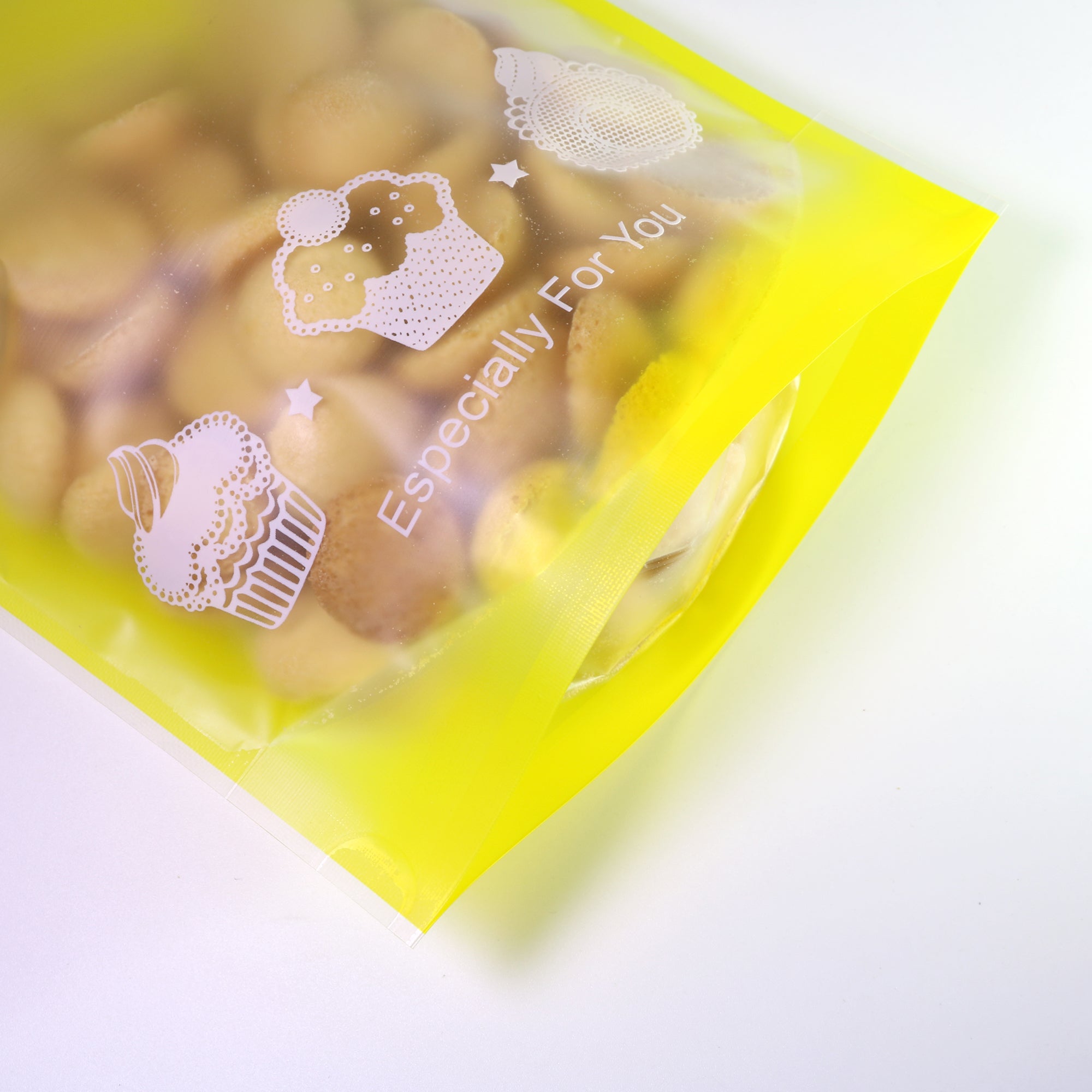 Frosted Front with Bakery Print and Die Cut Handles Plastic Stand Strong® Bags